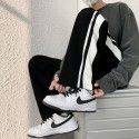 Casual pants men's autumn new style Hong Kong fashion brand striped loose pants men's straight leg wide leg sports pants 