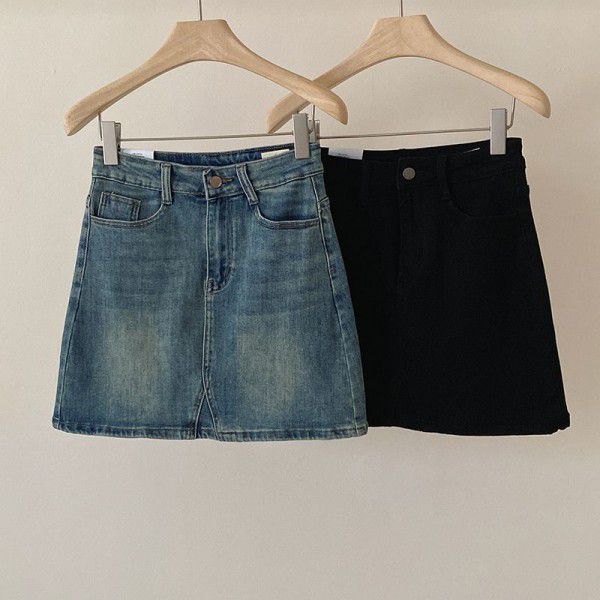 Elastic and minimalist denim skirt for women in early spring, new high waisted and slim A-line short skirt