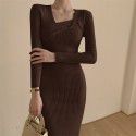 Core spun knitted long sleeved dress with V-neck slimming and black mid length slit buttocks skirt