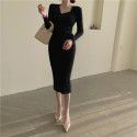 Core spun knitted long sleeved dress with V-neck slimming and black mid length slit buttocks skirt