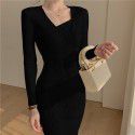 Core spun knitted long sleeved dress with V-neck slimming and black mid length slit buttocks skirt