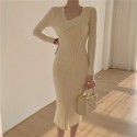 Core spun knitted long sleeved dress with V-neck slimming and black mid length slit buttocks skirt