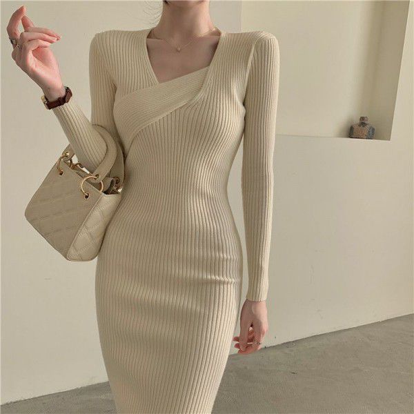 Core spun knitted long sleeved dress with V-neck slimming and black mid length slit buttocks skirt